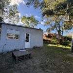 Casa en ALQUILER 1 dormitorio Lagomar, muy segura al fondo con parrillero y demas